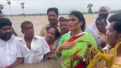 Congress leader YS Sharmila protests flood situation by wading waist-deep in water | Watch