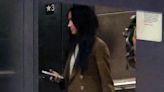 Meghan Markle sports white trousers and brown coat as she lands in LAX