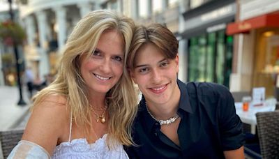 Penny Lancaster rocks crochet mini dress in holiday snap with towering model son Alastair