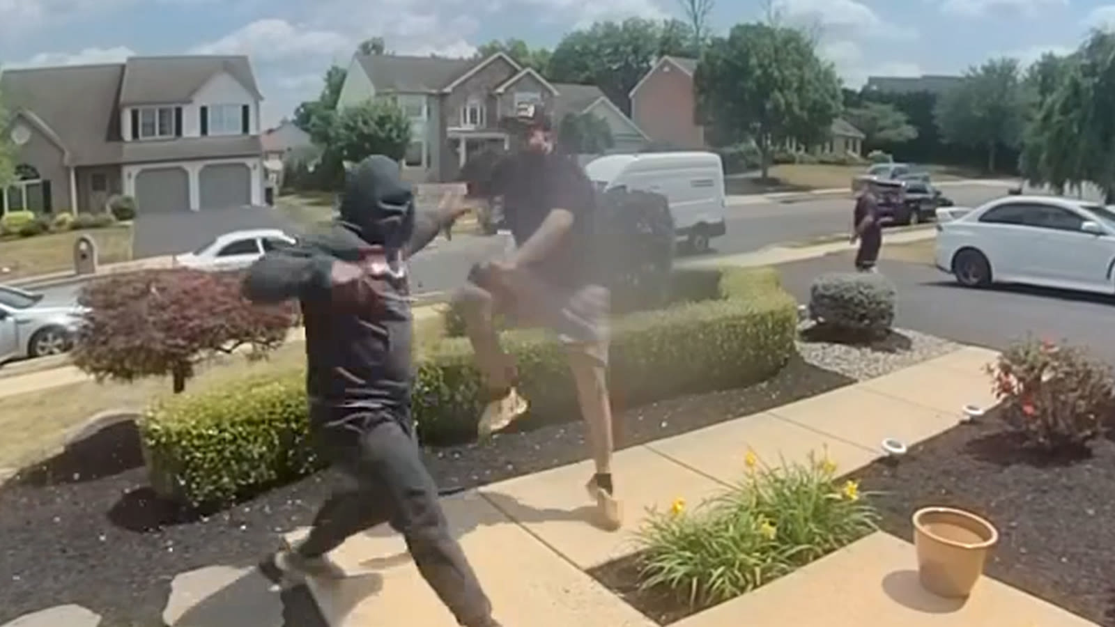 Dueling porch pirates scuffle to steal package outside Pennsylvania home