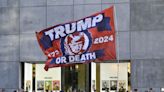 Inverted American flags appear outside California library