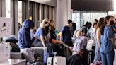 Passengers stranded at Newark airport slept on tables and luggage carts after hundreds of flights were canceled or delayed, report says