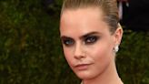 Cara Delevingne debuts a jaw-dropping white feather pixie haircut