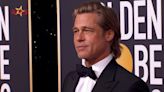 Tuxedo time: Brad Pitt's secret to red carpet charm!