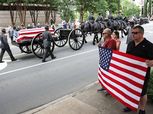 Photos from CMPD Officer Joshua Eyer’s memorial service, procession in uptown Charlotte