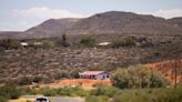 Man arrested on arson charge after Arizona wildfire destroyed 21 homes, caused evacuations