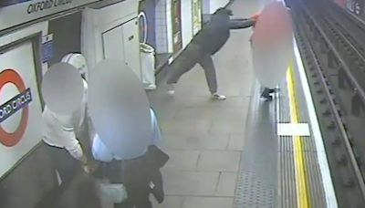 Moment thug shoves postman on to Tube tracks just as train pulls into station