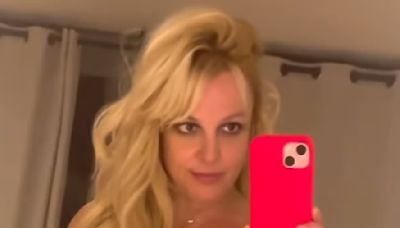 Britney Spears puts on a daring display in two glamorous dresses