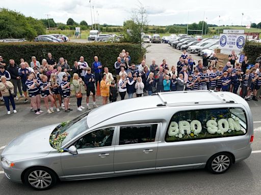 Mourners line streets to pay final respects to Rob Burrow ahead of funeral