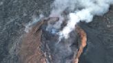 An Iceland volcano starts erupting again, spewing lava into the sky