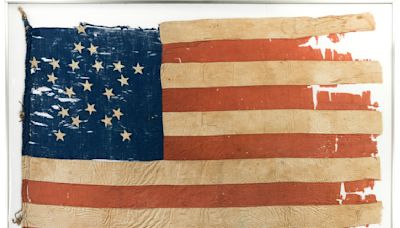 A 19th century flag disrupts leadership at an Illinois museum and prompts a state investigation