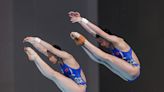 5 unreal Olympic synchronized diving photos, including Team USA's Cook and Bacon