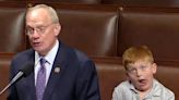 Congressman’s son steals the spotlight while his dad delivers remarks at the Capitol