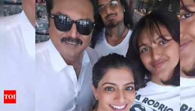 Varalaxmi shops in Dubai with Sarathkumar and Nicholai Sachdev | Tamil Movie News - Times of India