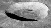 Earth's near miss with an asteroid that left 14-mile wide crater on Moon