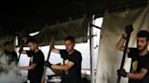 US-based charity World Central Kitchen has resumed its work in Gaza after an Israeli drone strike killed seven of its staffers -- local WCK volunteers cook meals for needy Palestinians in Rafah