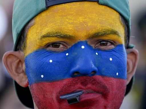 Venezuelans anxiously await results of presidential election that could end one-party rule