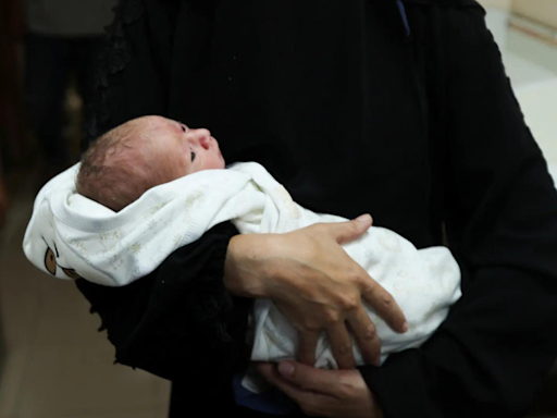 'Miracle': Gaza baby saved from dead mother's womb after Israeli airstrike - Times of India