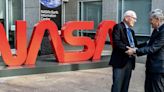 NASA awards medal to worm logotype designer Richard Danne