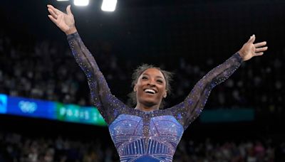 Simone Biles edges Brazil's Rebeca Andrade for her second Olympic all-around gymnastics title