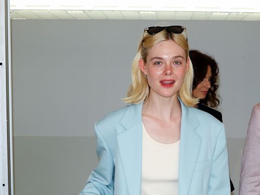 Elle Fanning Touches Down in Cannes in the Chicest Baby-Blue Suit