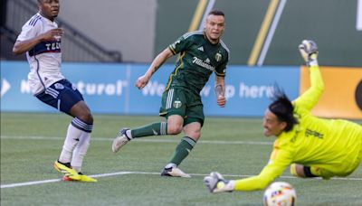 Rodriguez and Mora score to give Timbers a 2-0 win over Whitecaps in Cascadia Cup matchup