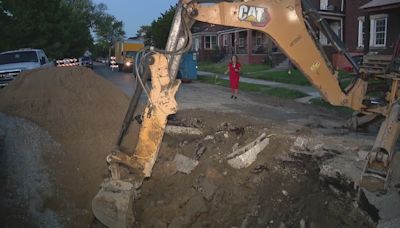 Woman drives into large sinkhole in southwest Detroit, repairs underway