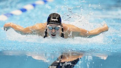 Gretchen Walsh sets a world record in the 100-meter butterfly at the U.S. Olympic trials