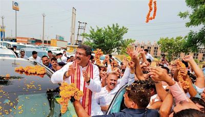Minister Pradhan, Biplab Deb given warm welcome on way to Rohtak
