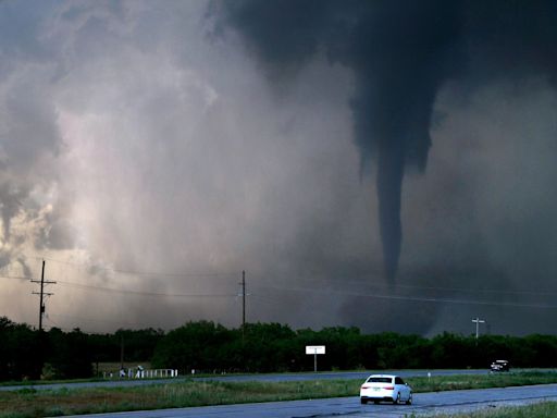 Tornadoes kill 13 in trail of destruction across three states