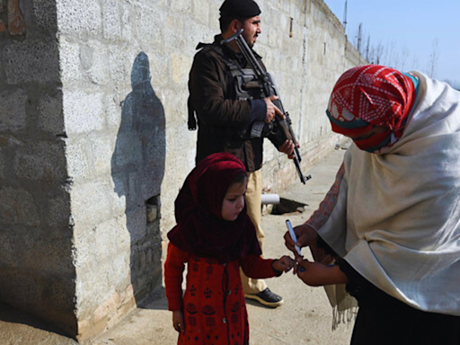 2 police officers injured in separate attacks on anti-polio teams in northwest Pakistan Peshawar