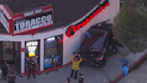 1 hospitalized, 1 arrested for DUI after collision causes car to veer into Valley Glen shop