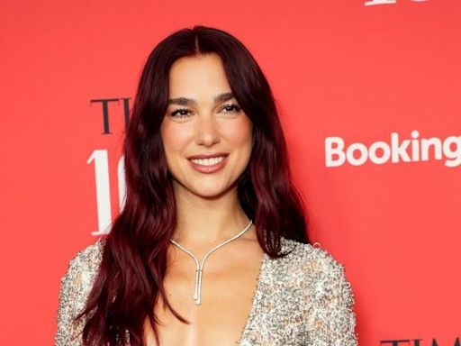 Dua Lipa Wore a transparent Chanel Dress Embroidered With Crystals