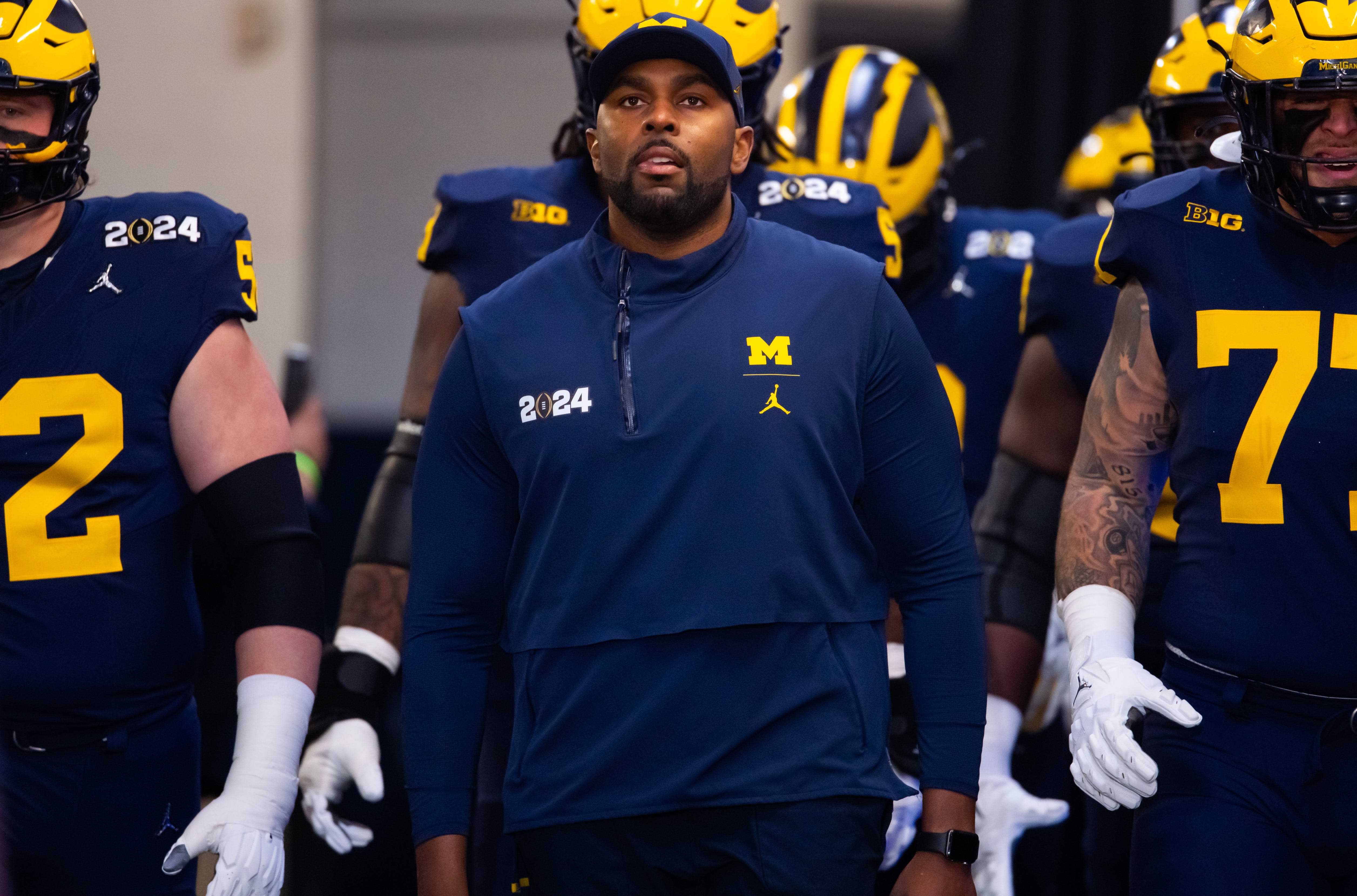 Michigan cannot fire coach Sherrone Moore for cause for known NCAA violations in sign-stealing case