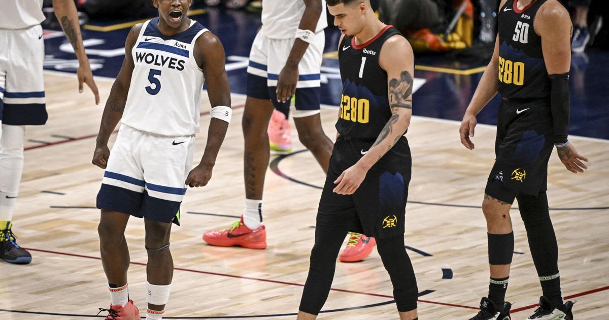 Anthony Edwards of the Minnesota Timberwolves celebrates as Michael Porter Jr. and Aaron Gordon of the Denver Nuggets walk to the bench for a timeout during the fourth quarter of the Timberwolves’ 106-80...