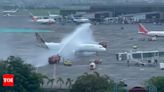 Watch: Team India's flight gets a water cannon salute at Mumbai airport upon arrival | Cricket News - Times of India