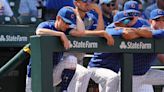 ...Craig Counsell, left, and the rest of the Cubs' bench reacts during seventh-inning action against the Cincinnati Reds at Wrigley Field on Friday, May 31, 2024, in Chicago.