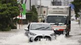 Heavy rains cause flooding and mudslides in southwest Japan, leaving 2 dead and at least 6 missing