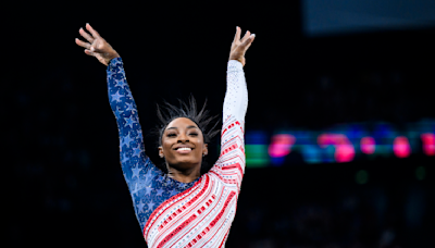 The glory of gold: Simone Biles grins as Team USA triumphs at women's team final