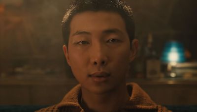 BTS’ RM Plays Multiple Roles (Including a Baby Man) in Cinematic Video For Solo Single ‘Come Back To Me’