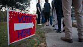 People wait in line to vote at a polling place on Nov. 8, 2022, in Fuquay Varina, North Carolina.