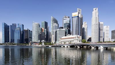 Tiny Singapore sees sudden frenzy in deals from around the world