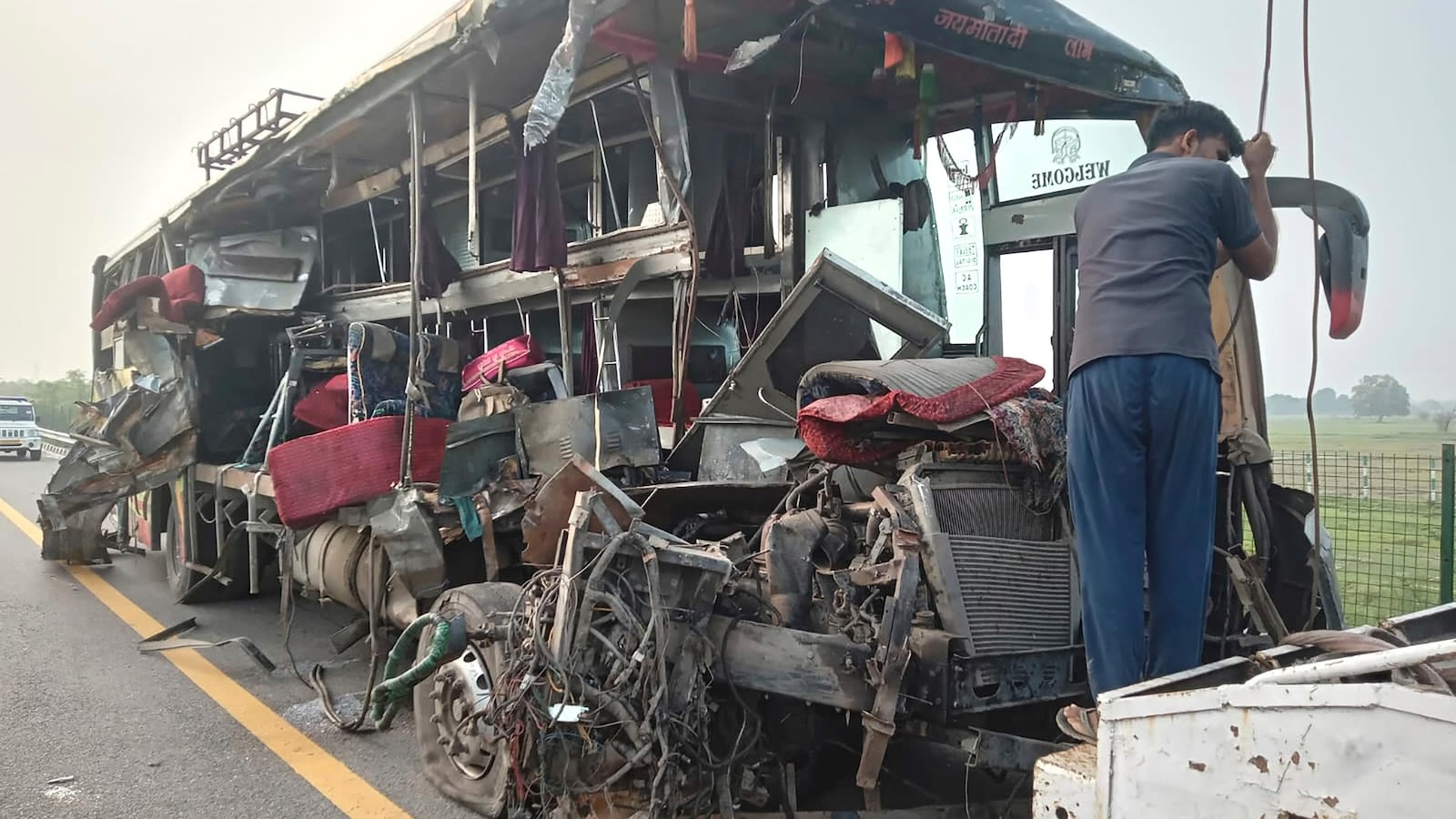 A double-decker bus collides with a milk truck in northern India, killing at least 18 people