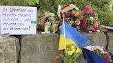 German police arrest a Russian man in connection with the fatal stabbings of 2 Ukrainian men