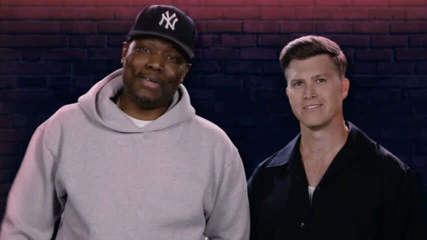 Colin Jost and Michael Che are hosting "some kind of live comedy thing" for Peacock