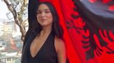 Dua Lipa Celebrates Her New Albanian Citizenship in a Plunging Knit Dress and Cardigan Set