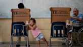 Panamanians vote in an election dominated by a former president who was barred from running