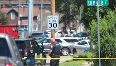 Armed bicyclist killed in Iowa shooting that wounded 2 police officers, investigators say