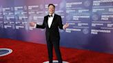 Musk Hit the Red Carpet Just Before Tesla’s Biggest-Ever Layoff