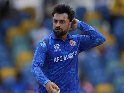 ICC reprimands Rashid Khan for throwing bat on the ground during T20 World Cup match | Cricket News - Times of India